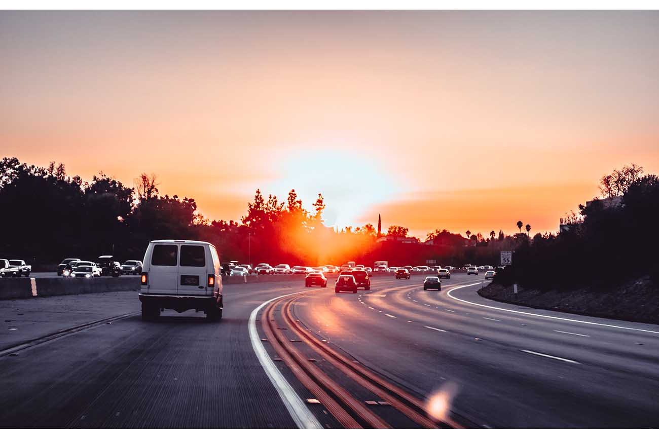 Highway traffic at sunset